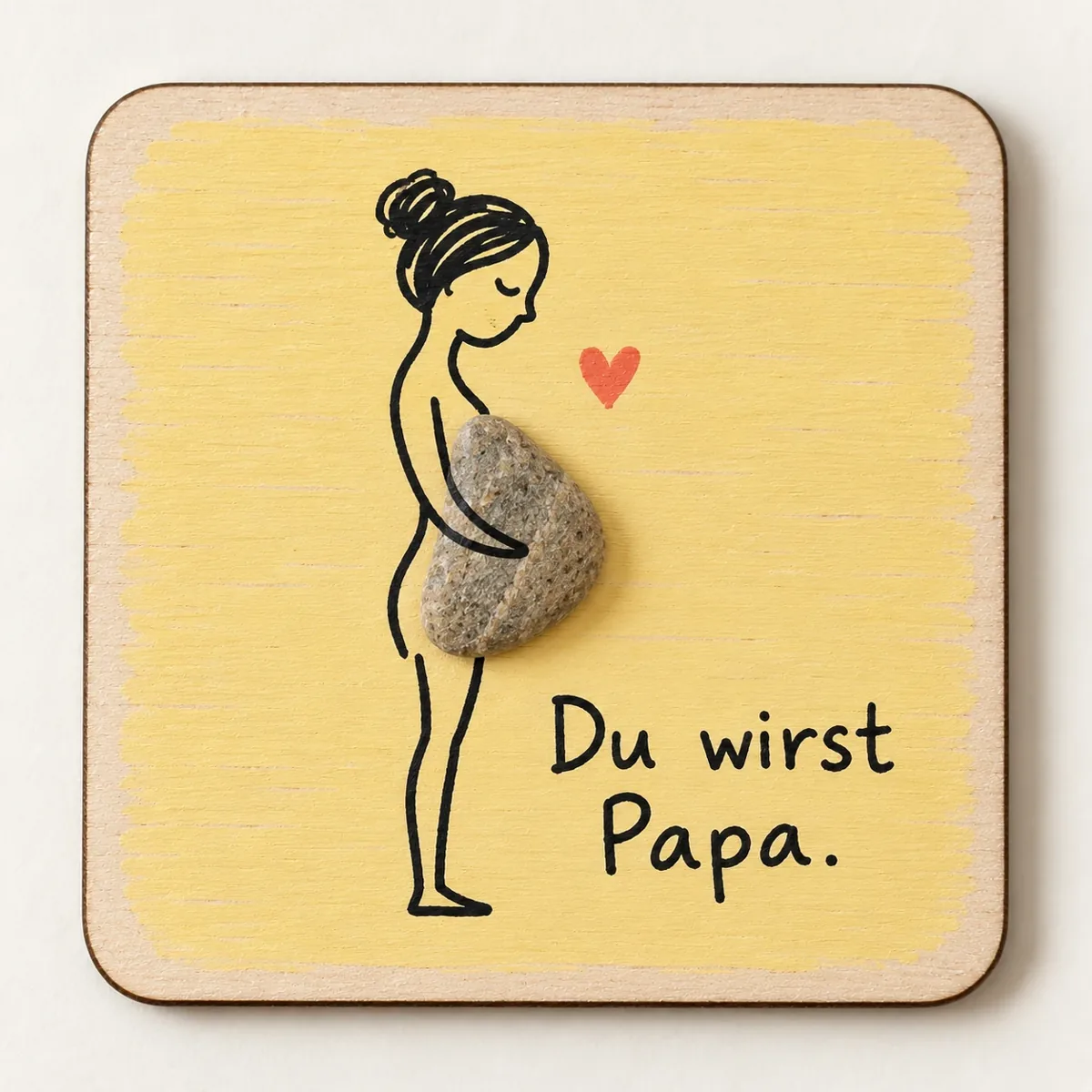 Handgemachter Schmölli „Du wirst Papa“ auf einer farbig bemalten Holzplatte